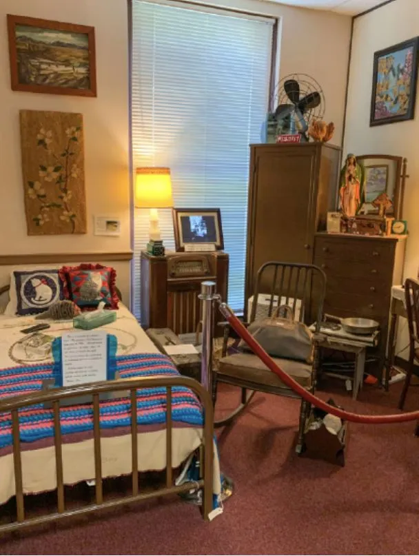 Interior of the Carville museum showing personal artifacts and exhibits