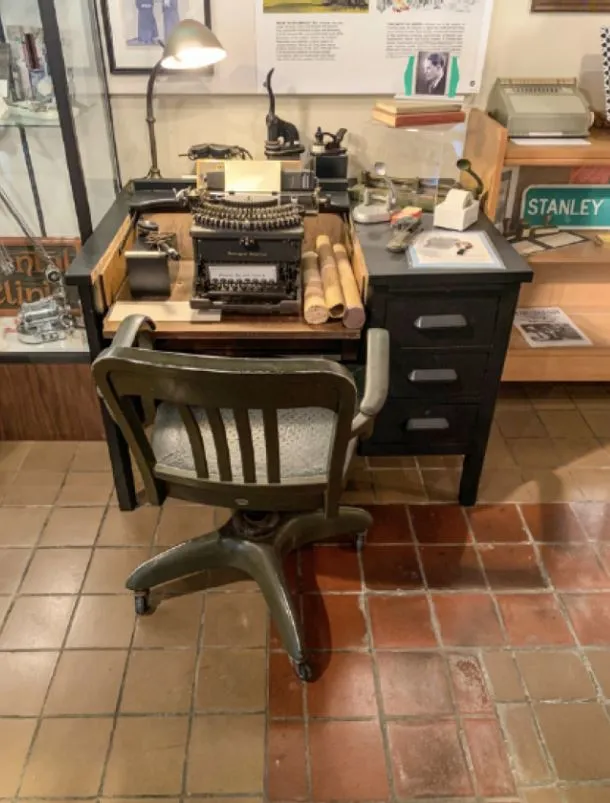 Interior of the Carville museum showing personal artifacts and exhibits
