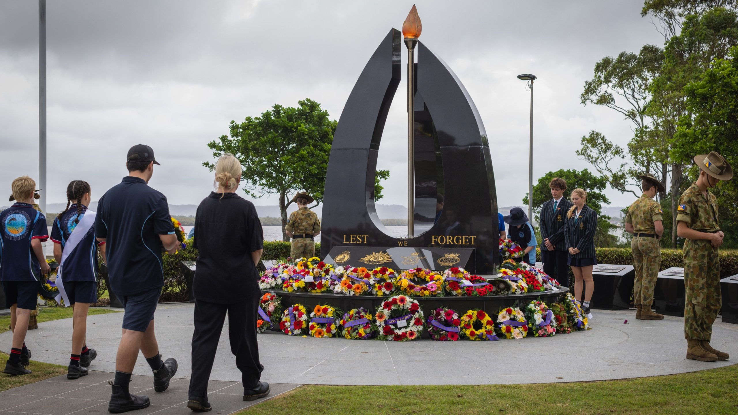 A formal award presentation moment symbolising recognition for contributions to peace and service.