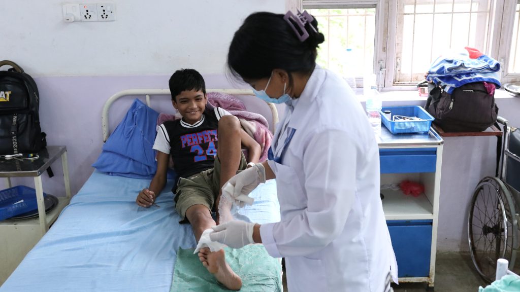 Community member in rural Nepal participating in a health and support program.
