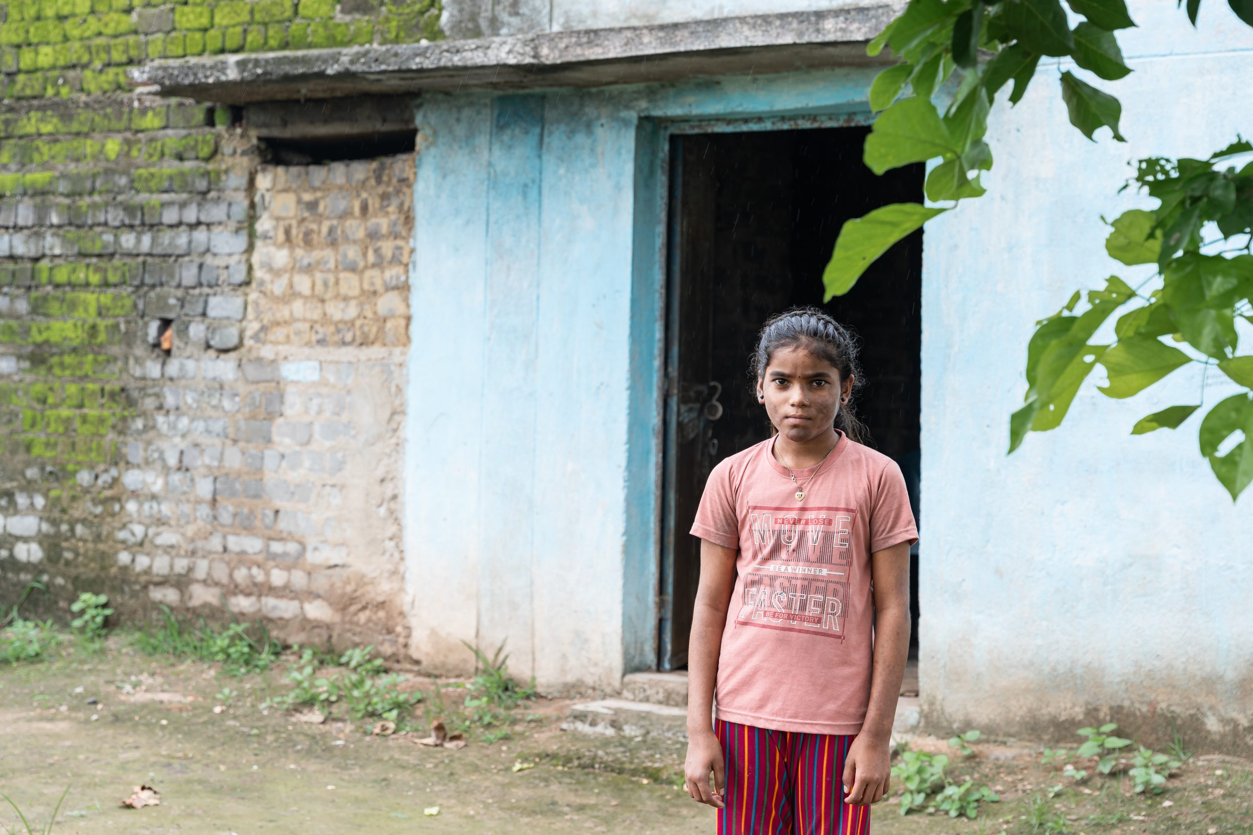 Portraits of Nisha both inside and outside her home in Chattisgarh.