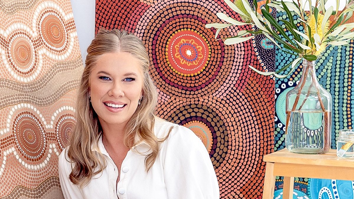 Portrait of First Nations artist Domica Hill, a Pakana woman whose artwork features on gifts in The Leprosy Mission Shop for NAIDOC Week