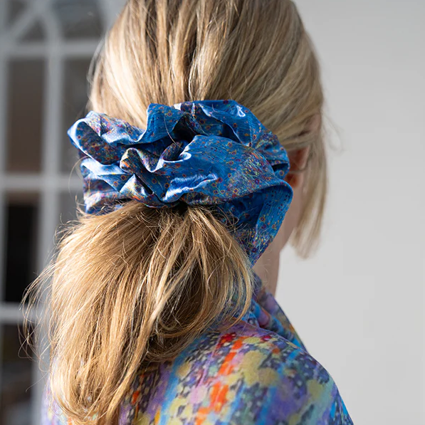 Morning Mist hair scrunchie featuring artwork by First Nations artist Marlene Harold